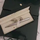 قلم وكبك ماركة رولكس لماع درجة أولى