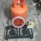 اسطوانه غاز جديد مليان مع موقد شعلتين والمنظم جديد