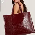 شنطة تيد بيكر