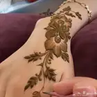 حنا وصبغه ورسم على الوجهه