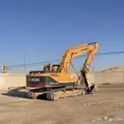 بوكلين . حفر اراضي