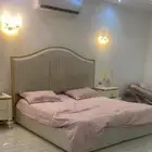غرفة نوم ودولاب