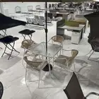 كراسي مع مظله وطاوله