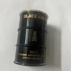 برميل مصغر داخله عينة بترول