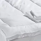 لبادة ( واقي مرتبة ) من الريش
