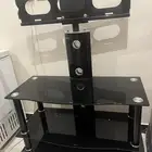 طاولة تلفزيون مع قاعدتها