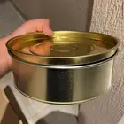 علب تنك تمر فارغ