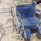 كرسي مع عكاز صدقة لوجه الله