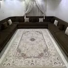 كنب ومفرشة وستارة