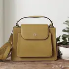 شنطة اقنر لون أصفر