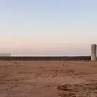 ارض مسوره بحقروصين على شارعين واصل زفلت وكهرباء