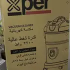 مكنسة كهربائية جديدة بكرتونها