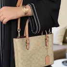 شنط من ماركة كوتش وشانيل لا يفوتك