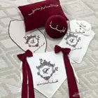 تطريز لبس مواليد وشاح