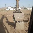 يوجد لدينا بكلين وقلاب لقص الأراضي وبنيان الحجر