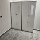 دولاب خشب بابين الون ابيض او بني سم جديد