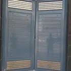 دهان ابواب حديد زيتي اللون رمادي