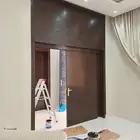 معلم دهان ابواب خشب زيتي اللون بني محروق