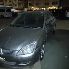 سيارة موتسبشي لانسر 2004قير عادي لوحه مميزه السعر 10الف مع