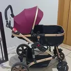 عربة اطفال TEKNUM بحالة الجديده استخدام خفيف جدا كما هو موضح