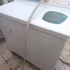 غسالة وفليزر
