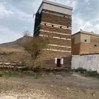 ترميم بيوت الطين وبناها تركيب حجر طبيعي توريد جرع واثل وحجر