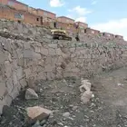 بكلين لقص ألاراضي وتكسيرالصخور