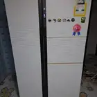 ثلاجه سامسونج مستعملة ونظيفة للبيع و حوض سمك كبير