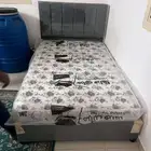 medium sized high quality bed and mattress available