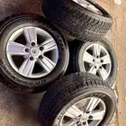 كفرات دلوب 285.60.18 مع جنوط جيب لندكروز 2015 اصلي وكاله