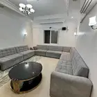 كنب وطاولة تلفزيون وطاولة خدمة
