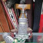 جنبيه كفو الشكل في الصوره قبل تغيير لون الحزام الى لون اسود