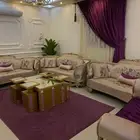 كنب مجلس مع الستاره والطاولات والسجاد بدون المكيف