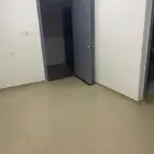 شقه بالحي الاخضر مكونه من غرفتين وصاله