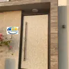 أبواب مداخل حديد مع كلادينج للمنازل