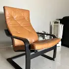 كرسي استرخاء اللون جملي