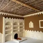 ترميم وبناء بيوت الطين والملاحق الشعبية