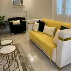 كنب مع طاوله وفرشه