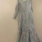 الون سماوي فاتح والقماش شك وتم لبسه مره واحد  الطول 143سم