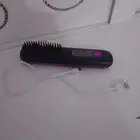 مشط كهربائي لتنعيم الشعر