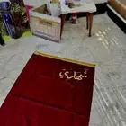 سجادة صلاة مع كتابة الاسم