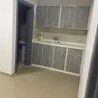 شقة بالحي الاخضر قريبه من مجمع توبال الطبي