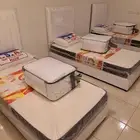 أسرة خشب جديدة