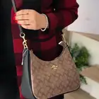 شنطة ماركة كوتش