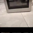 ستائر وطاوله شاشه ونجف وفرن كهربائي