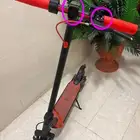 سكوتر كهربائي نظيف وسريع لونه احمر واسود