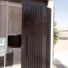 دهان ابواب حديد وخشب ناري وزيتي