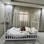 سرير اطفال خشبي