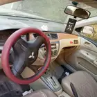 لانسر 2009 استماره منتهيه وفحص منتهي مكينه وقير بحاله جيده
