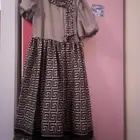 فستان سهره بناتي بني على اسود مع حزام لبس لعده ساعات فقط